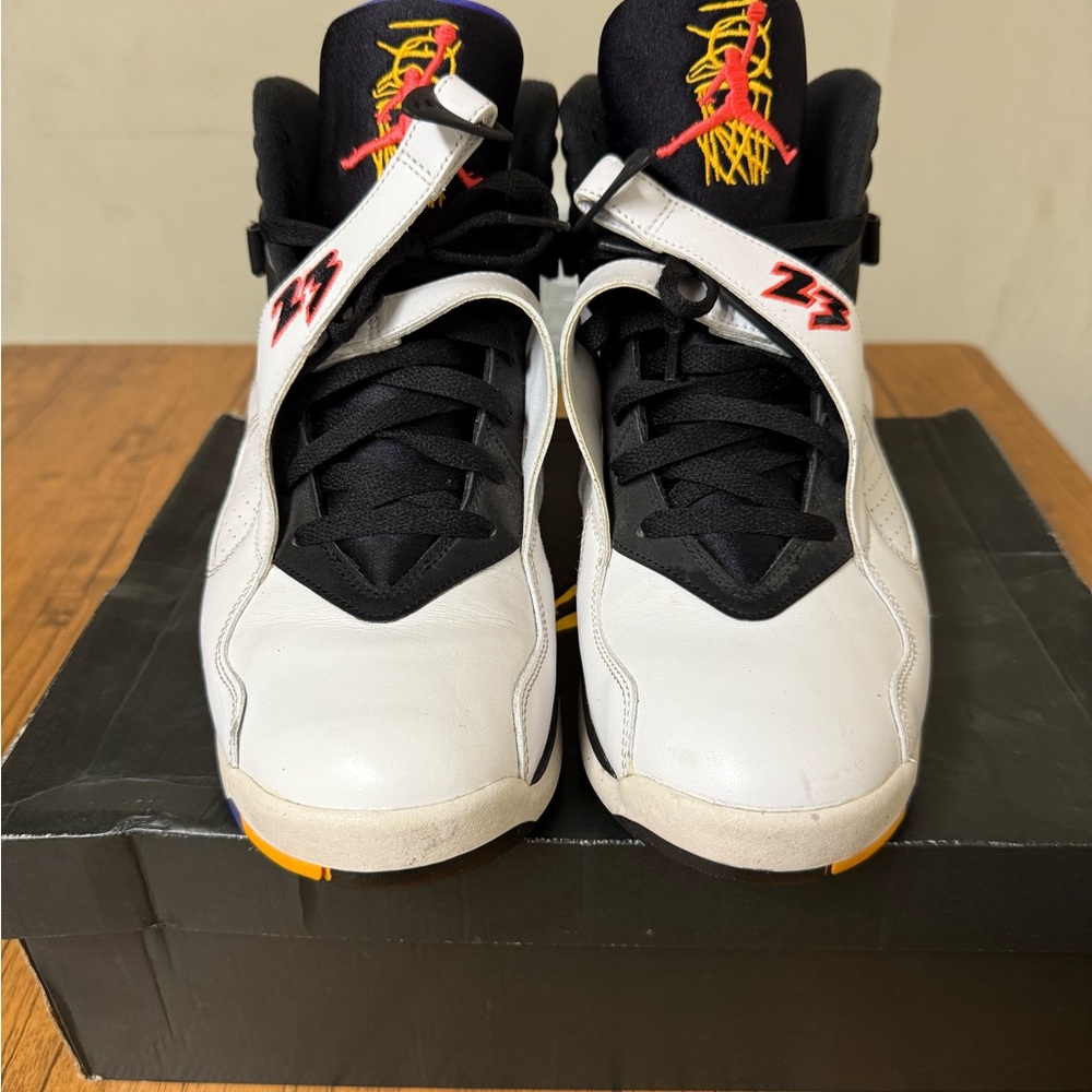 Jordan Black and White Athletic Shoes with Red Accents